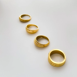 European style stackable gold rings featuring spring texture and multi-layer arched designs