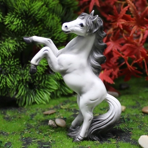 Realistic white resin horse figurine jumping on mossy garden landscape ornament