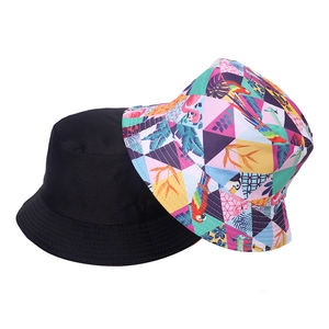 Detail showing high-quality canvas fabric in solid black and tropical geometric print
