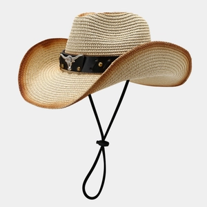 Western straw cowboy hat with silver bull head metal accessory and adjustable chin strap