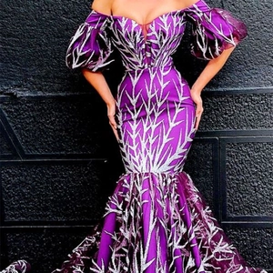 Elegant purple off-shoulder mermaid evening gown with silver sequin embroidery details