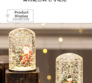Detailed view of musical snow globe lantern with wood texture base and festive bokeh lights