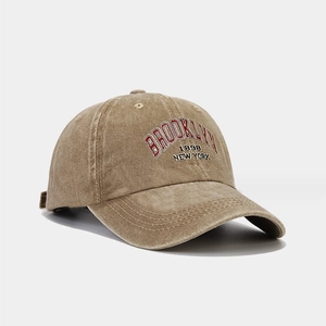 Detailed embroidery of BROOKLYN 1898 on khaki washed cotton baseball cap