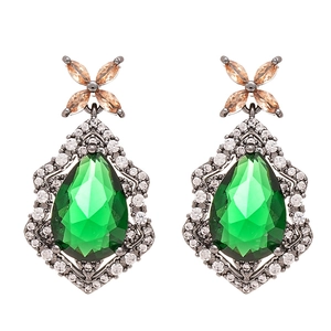 Vintage water drop earrings with emerald green zircon and champagne stones on white back