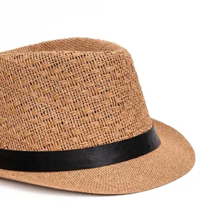 Classic straw panama hat with black ribbon band and vintage weave for sun protection