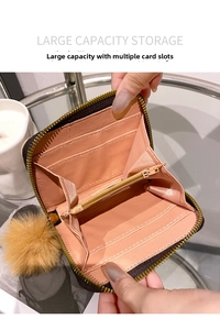 Detailed interior of contrast color wallet with multiple card slots and coin pocket