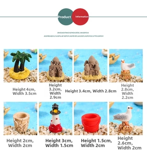 Detailed size chart showing dimensions for miniature sand castle and ocean decor items