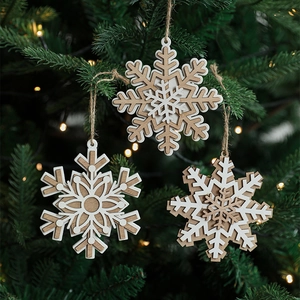 Nordic wooden snowflake Christmas tree ornaments set on festive tree branches