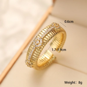 Macro detail of 18K gold plated ribbed ring with zircon floral clusters and 0.6cm width