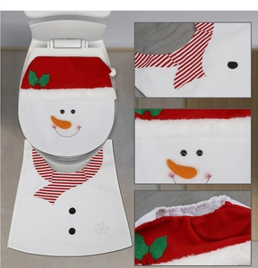 Detail of Christmas snowman toilet cover set featuring red flannel and holly leaf embroidery