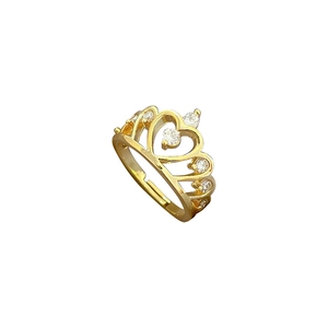 Adjustable gold crown ring featuring hollow design and sparkling white cubic zirconia