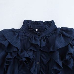 Elegant French vintage dark blue blouse with ruffled collar and textured fabric detail