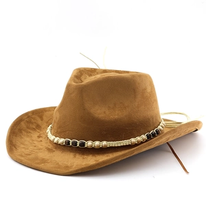 Detail of vintage brown suede cowboy hat with handcrafted wooden bead band and brim