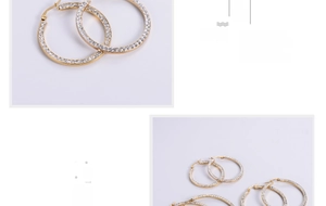 Macro shot of gold-plated titanium steel hoop earrings with crystal pavé setting details