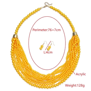 Detail of layered bright yellow pearl necklace and earrings with length dimensions