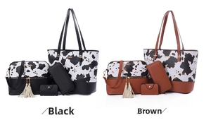 Detail view of four-piece handbag set featuring cow print and solid faux leather styles