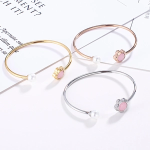 Minimalist open flower bangle with pearls in gold, silver and rose gold metal tones