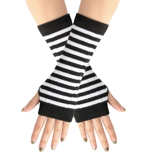 Close-up of black and white striped knitted arm warmer with fingerless thumb hole