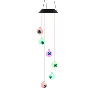 Solar powered Halloween wind chime with six glowing colorful eyeballs for garden decor