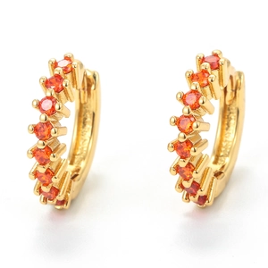 18K gold plated huggie earrings with round orange cubic zirconia pave settings