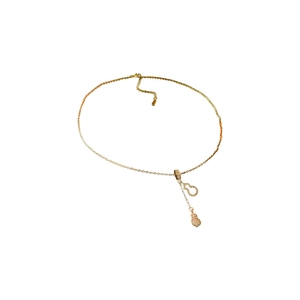 Golden stainless steel tassel necklace with cubic zirconia hollow gourd pendant