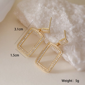 Luxury 18K gold plated rectangular drop earrings with zircon stones on white rock