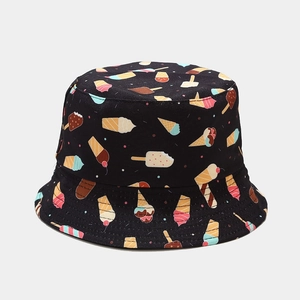 Close-up of black bucket hat featuring colorful ice cream prints on cotton canvas fabric