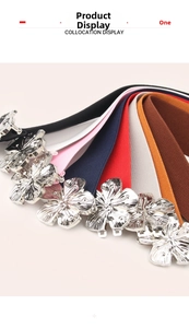 Collection of elastic waist belts featuring silver flower buckles in eight vibrant colors