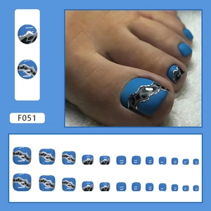 Stylish Klein blue press-on toenails with leopard print design and silver glitter.