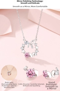 Detail of s925 silver necklace featuring cubic zirconia floral wreath and bow pendant