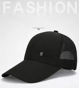 Detail of black sports baseball cap showing breathable mesh back and Sports embroidery