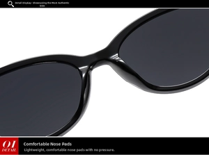 Detail view of lightweight integrated nose pads on black cat-eye sunglasses
