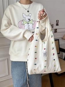 Off-white canvas tote bag with colorful flower embroidery and large capacity