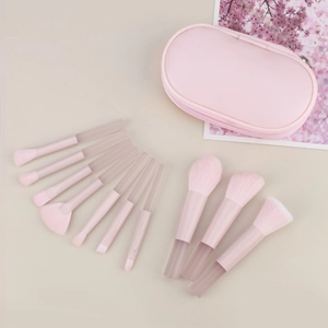 Set di 10 pennelli da trucco rosa con setole morbide e custodia da viaggio coordinata