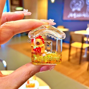 Cute Capybara liquid quicksand acrylic keychain in strawberry outfit house shape