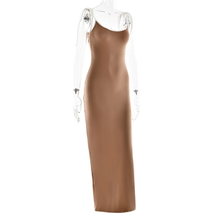 Detail view of the brown lace-up maxi dress with a tight fit and silky elastic fabric