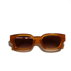 Retro cat eye sunglasses with amber orange frame and dark brown lenses for men and women
