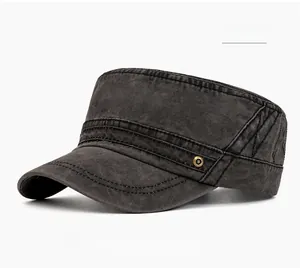 Detail of washed cotton black cadet cap with vintage texture and metal side buttons