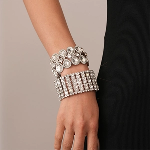 Luxurious silver stretch bracelets with pear-shaped rhinestones and geometric wide designs
