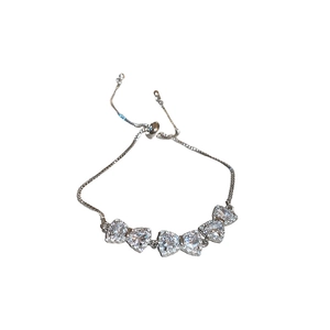 Elegant silver bow bracelet with sparkling cubic zirconia and adjustable pull chain