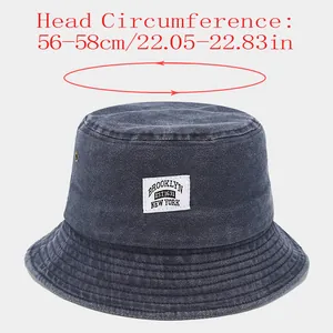 Size guide showing head circumference 56-58cm for the washed denim bucket hat