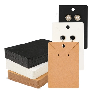 Blank kraft paper jewelry display cards for earrings and necklaces in black and white