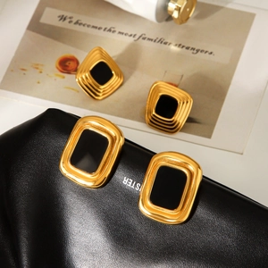 Retro geometric gold earrings with black enamel inlay in rectangular and rhombus shapes