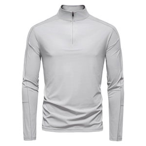 Detail of light grey men's sun protection shirt with half-zip collar and flat seams