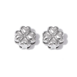 Elegant silver titanium clover earrings with polished heart-shaped petals on white background
