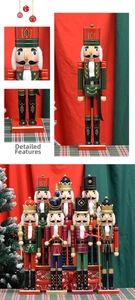 Close-up of wooden nutcracker soldier details with velvet fabric and classic crown