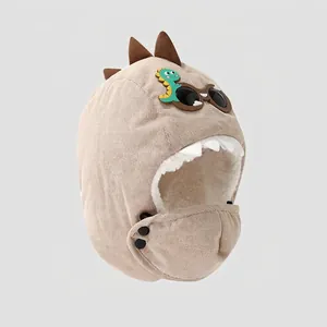 Detail of children's beige dinosaur trapper hat with goggles and protective mask