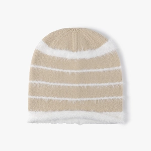 Beige knitted slouchy beanie with white plush stripes and wide folded faux fur cuff