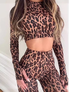 Women's two-piece leopard print workout set with long sleeve crop top and high waist leggings