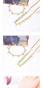 Detailed macro view of stainless steel S.STEEL hallmark on blue star and moon jewelry set